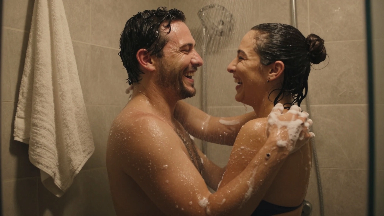 Two people laughing in a steamy shower, embracing naturally under running water.